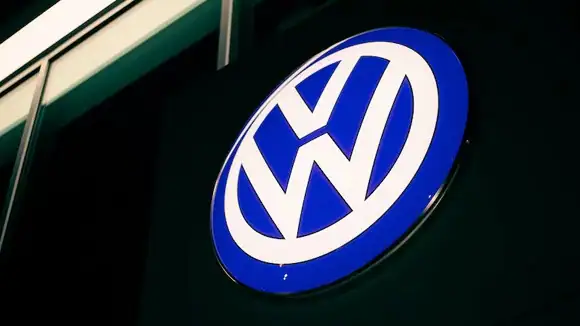 Which political leader laid the cornerstone of this manufacturing company? - George W. Bush, Nelson Mandela, Benito Mussolini, Adolf Hitler