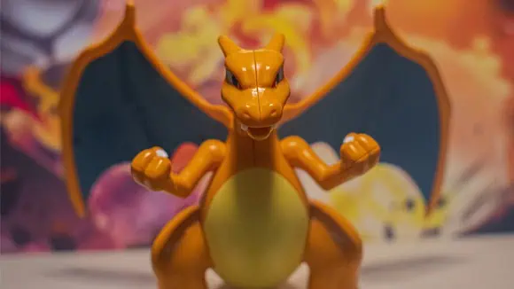 Identify this Pokemon - Arcanine, Mimikyu, Blastoise, Charizard